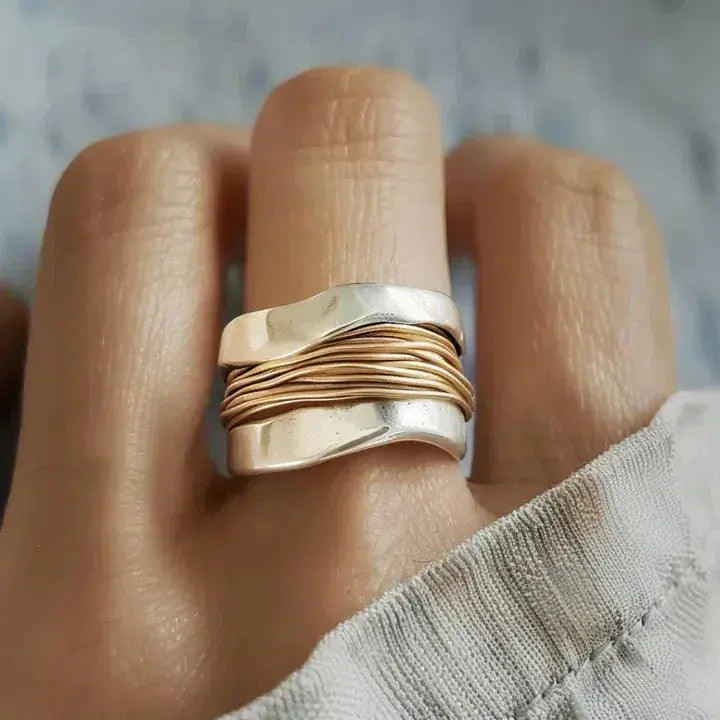 Silver ring with gold wire
