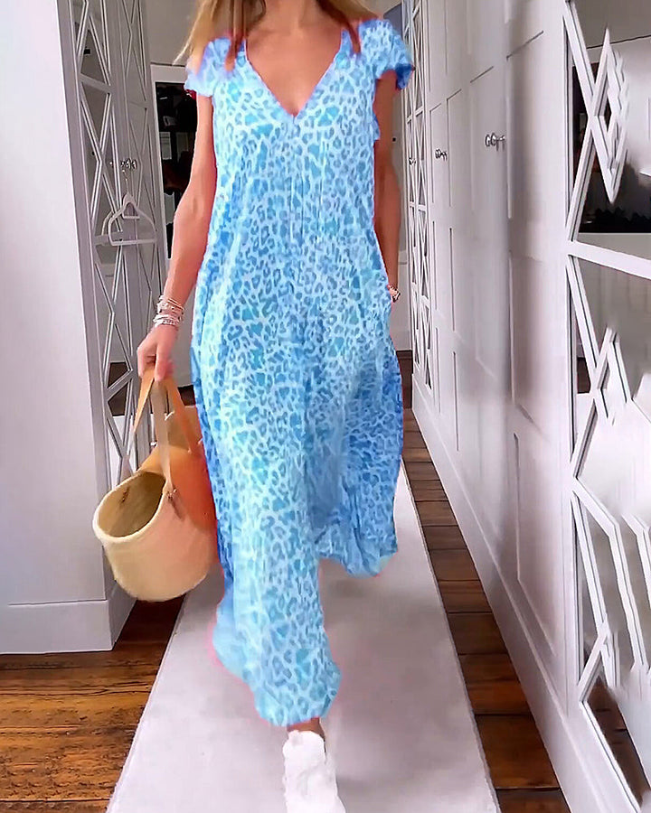 Long V-neck printed dress with short sleeves